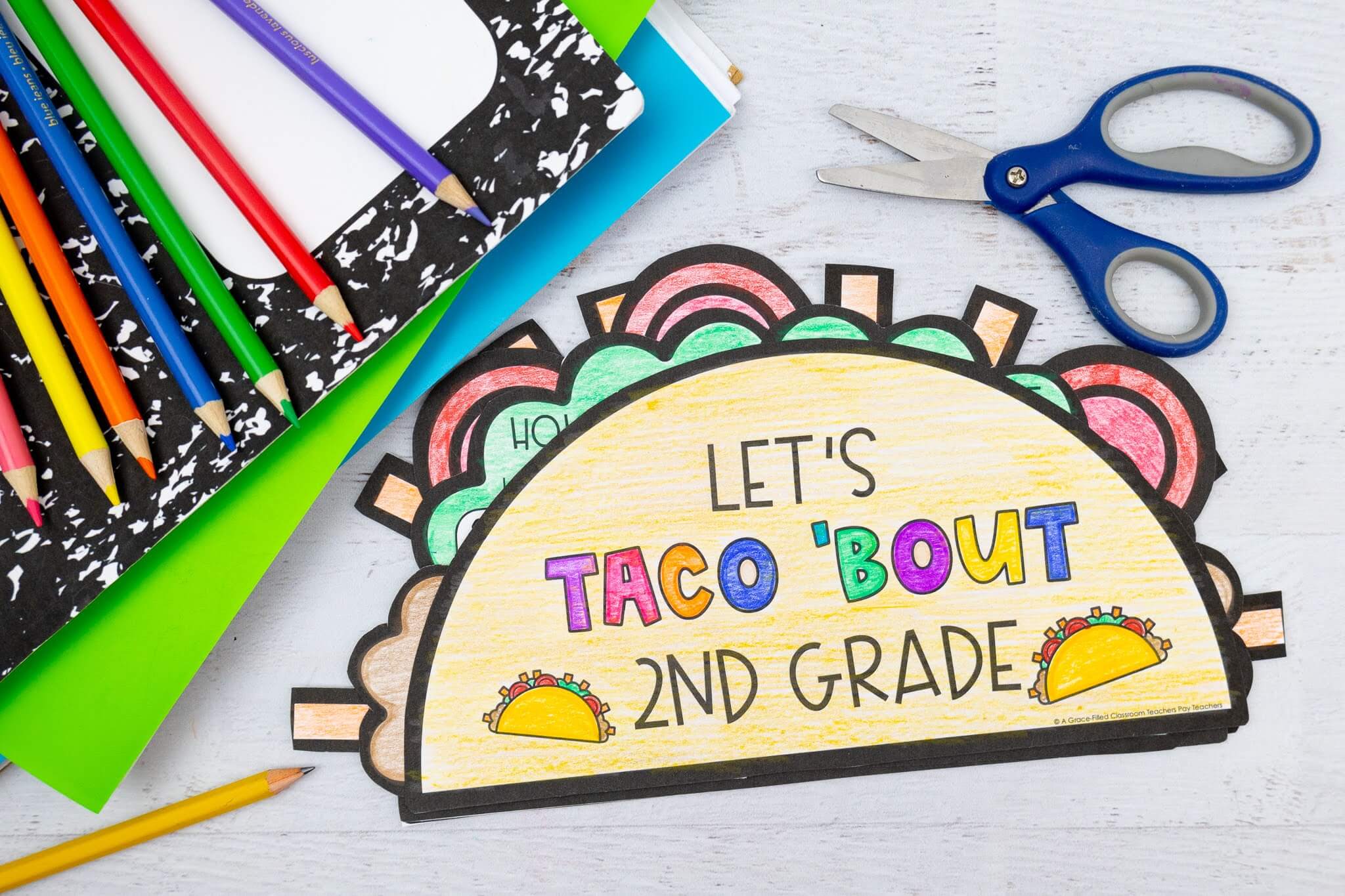 taco shell with the title Let's Taco 'bout 2nd Grade